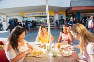 Guests enjoying food from Cruzin' Crepes one of thee newest food additions to the Boardwalk