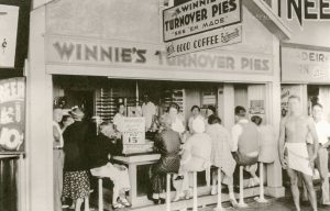 Winnie's Turnover Pie Shop, Winnie Blaisdell in the center serving customers delicious turnover pies, 1933