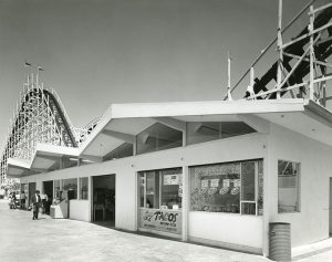 Boardwalk concession building in front of the Giant Dipper, 1963. The Abbott's Danish Pastry concession was on the right end