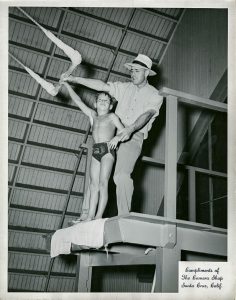 Skip assisting a young Water Carnival performer, ca. 1940