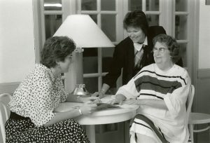 A promotional photo of Tish (left) and Dianna (center) with a Casa del Rey resident, ca. 1988