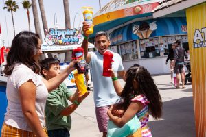 Family with 2022 beach bottles