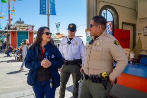 Jessica talking to security officers