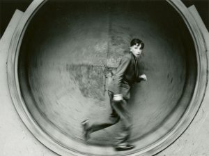 Man In rotating tunnel