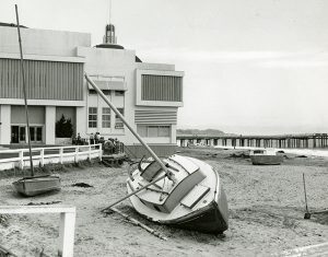 Boats washed ashore in front of the Casino after a storm, 1959.