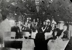 Boomers on the train at the Santa Cruz depot (Swanton is seated in the middle), 1907