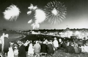 Crowds watching the fireworks show from the cliff above the San Lorenzo River, 1950