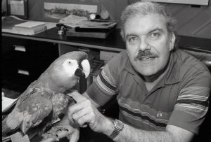 Ed and his macaw, "Albert", ca. 1982