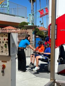 Sophia Brock securing guests on Lighthouse Lift-Off
