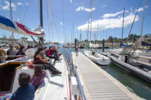 Santa Cruz Seaside Company team members aboard the Chardonnay getting ready to leave the dock.