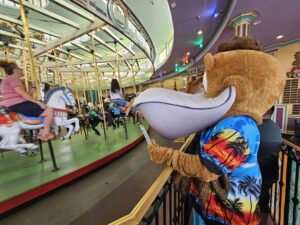 Splash eagerly waiting for his turn on the Carousel.