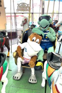 Splash and Mav'Riks on the Looff Carousel